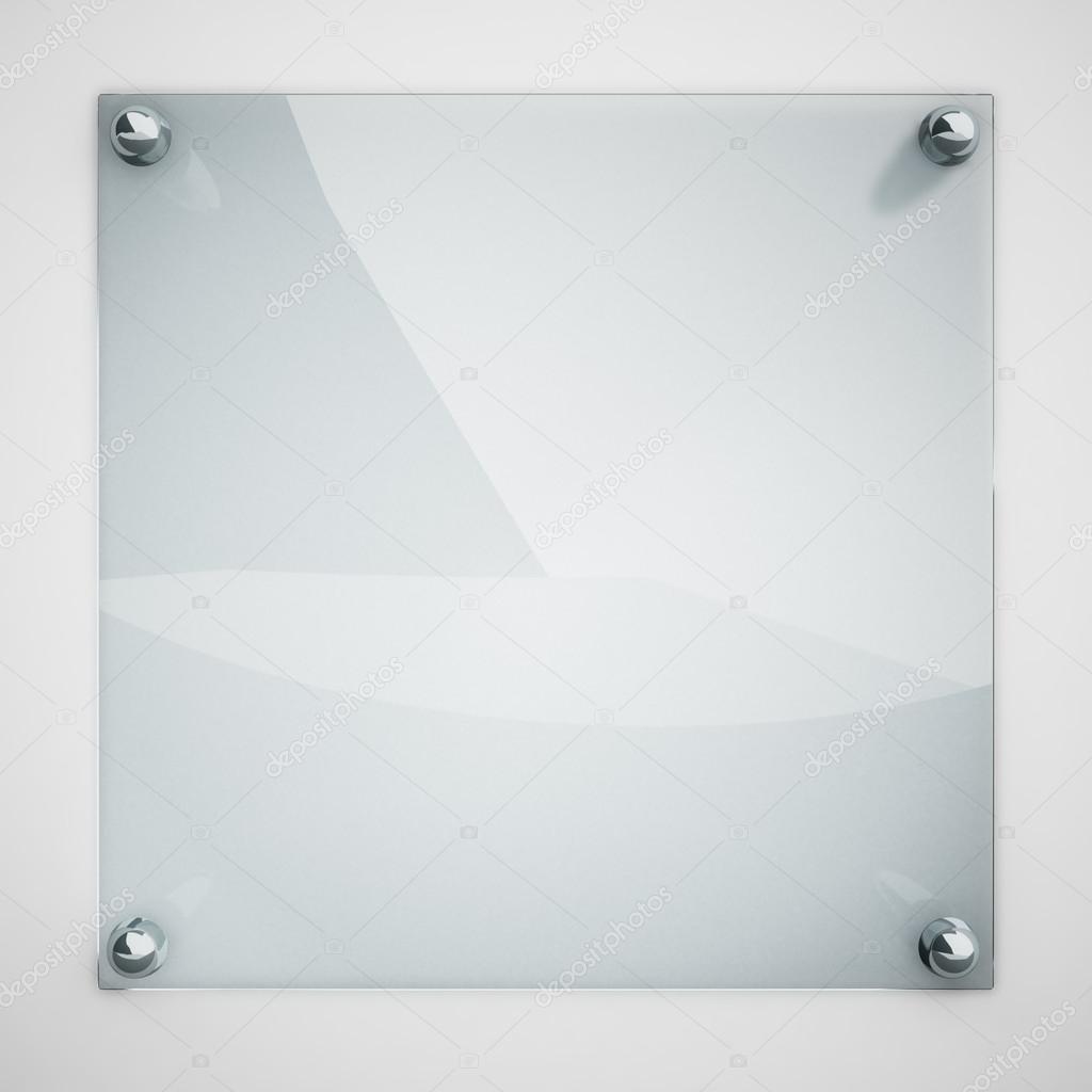 Protection glass plate fastened to white wall with metal rivets.
