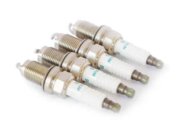 Iridium spark plug set isolated on white background. — Stock Photo, Image