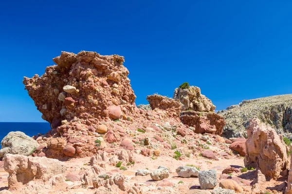 Punta des'elefant słynne czerwone skały w cala morell, menorca, spai — Zdjęcie stockowe