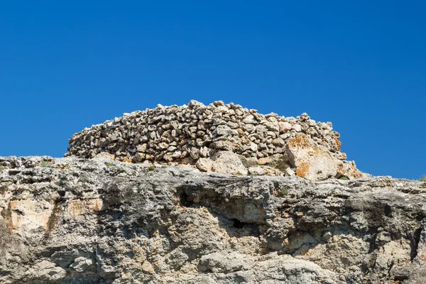 Ancient stone talayot at Menorca island, Spain. — Stock Photo, Image