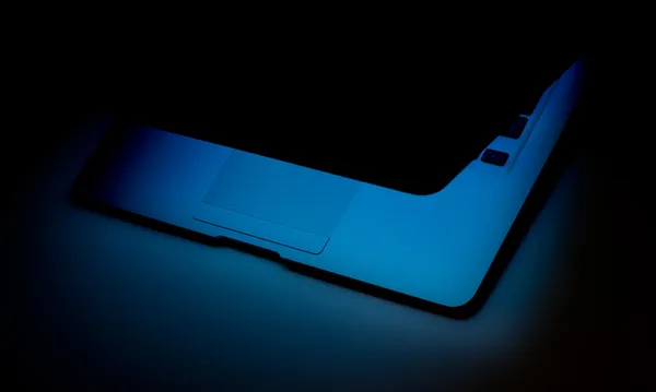 Laptop in the darkness — Stock Photo, Image