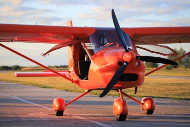 Small private propeller plane on the runway