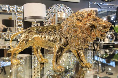 Luxurious golden lion sculpture on the table