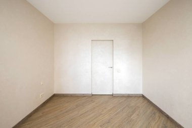 Empty bright room in the apartment in the interior