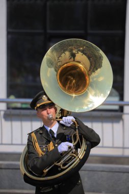 Kyiv, Ukraine - 24 august, 2021: A man from a military band plays the baritone on the Independence Day of Ukraine
