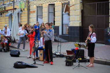 Kyiv, Ukraine - 24 august, 2021: Ukrainian street musicians play on the street in Kyiv