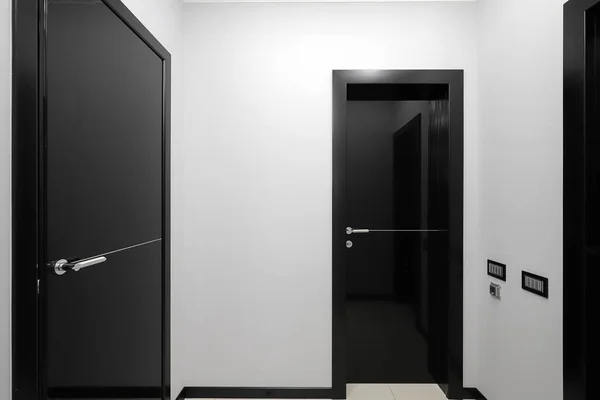 Black interior doors in the apartment