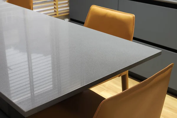 Quartz dining table with chairs in the kitchen