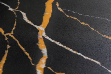 Siyah taş mermerin dokusu yakın plan. 