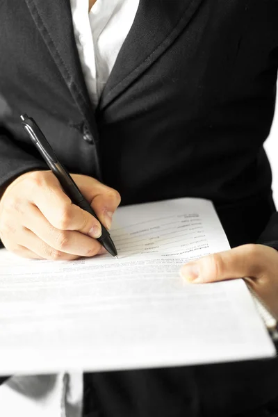 Woman write on document — Stock Photo, Image