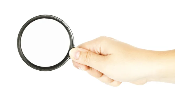 Magnifying glass in hand — Stock Photo, Image