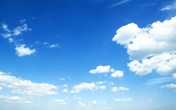 Blue sky with white and grey clouds — Stock Photo, Image