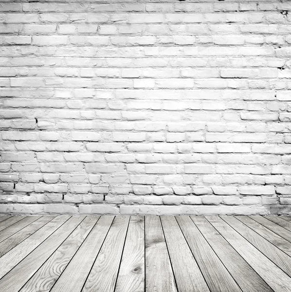 Vintage room with brick wall and wooden floor — Stock Photo, Image