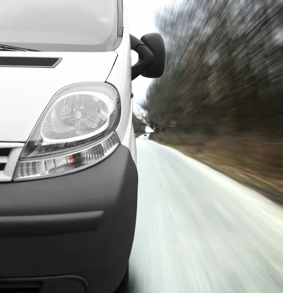 Minivan on road — Stock Photo, Image