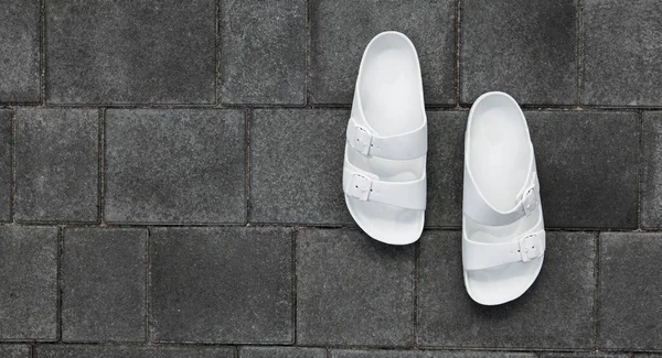 Pair White Flip Flops Paving Slabs — Stock Photo, Image