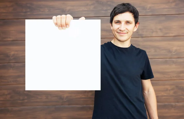 Guy Holding Big White Paper Hand Mockup Advertising Greeting Invitation — Stock Photo, Image