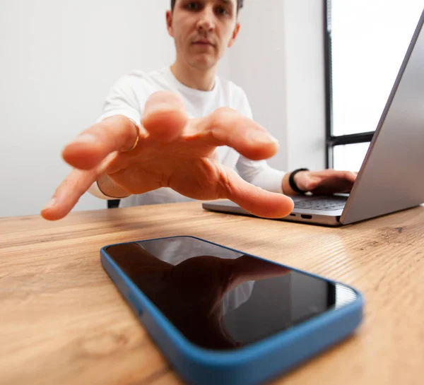 Man Addicted His Phone Pulls His Hand Take Play Games — Stock fotografie