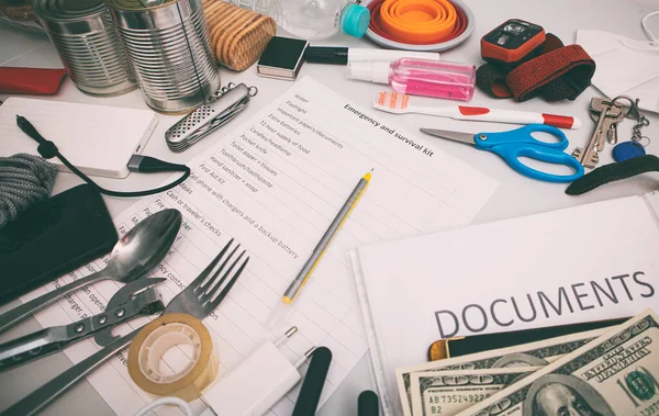 Emergency Backpack Equipment Organized Table Documents Water Food First Aid — Stock Photo, Image