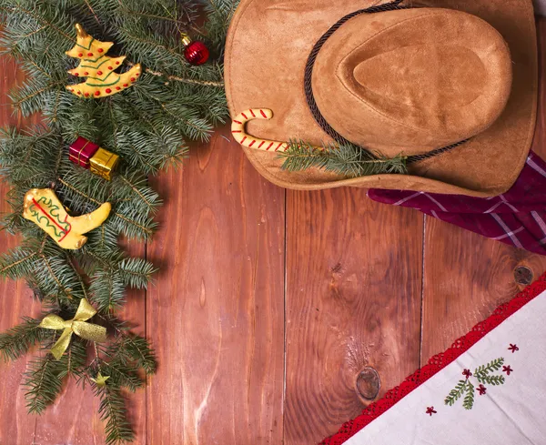 Fondo de madera de Navidad vaquero con decoraciones navideñas — Foto de Stock