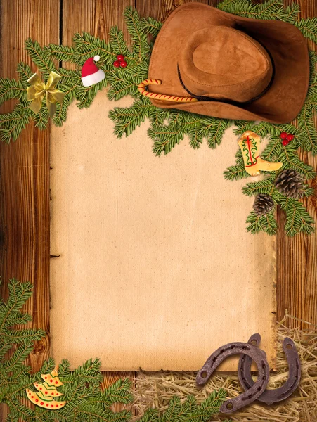 Navidad fondo occidental americano con sombrero de vaquero y viejo pa — Foto de Stock