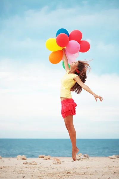 Девушка с воздушными шарами Стоковая Картинка