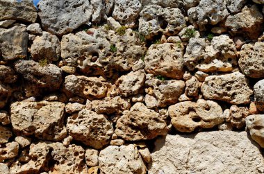 Textured wall of Neolithic megalith temple complex of Ggantija, Gozo island, Malt