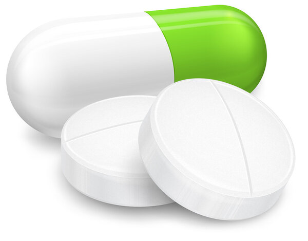 Различные таблетки на белом
