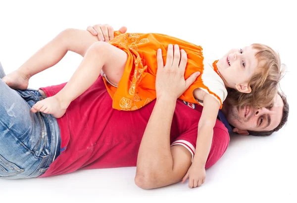 Meisje met haar vader in een studio — Stockfoto