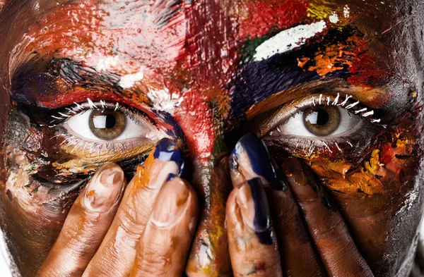 A woman's face in oil paints — Stock Photo, Image