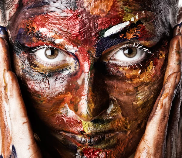 A woman's face in oil paints — Stock Photo, Image