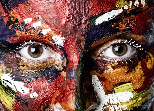 A woman's face in oil paints — Stock Photo, Image