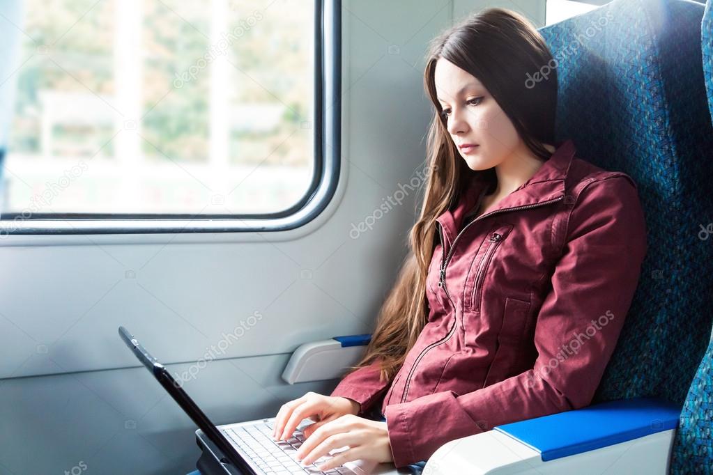 Woman is sitting in the train