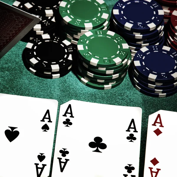 Aces  with blurry chips — Stock Photo, Image