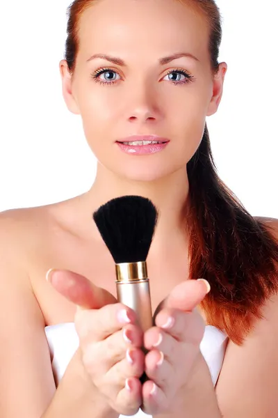 Woman applying blusher — Stock Photo, Image