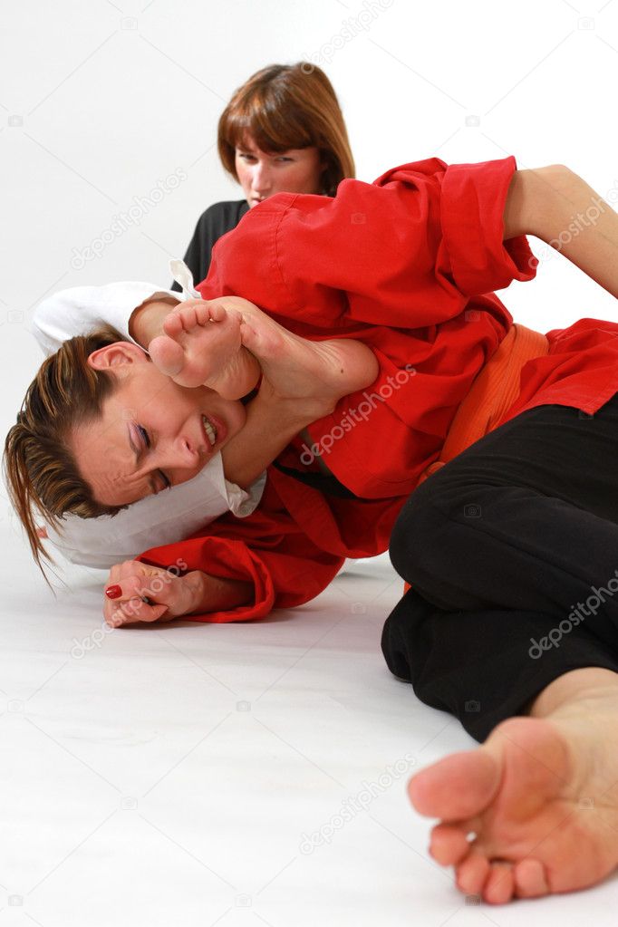 women fighting martial arts