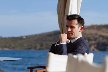 Young handsome guy in suit