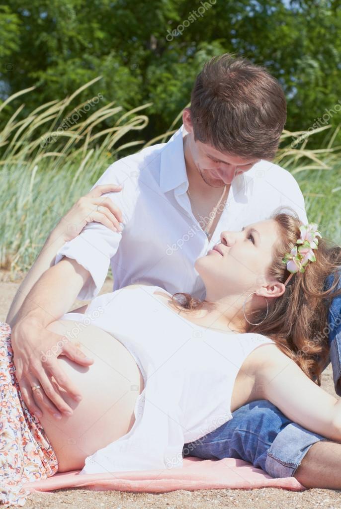This young couple is happily waiting for their first child to be born soon