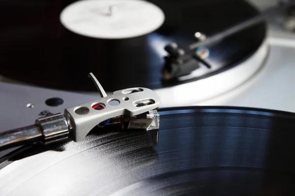 Turntable playing vinyl record with music — Stock Photo, Image