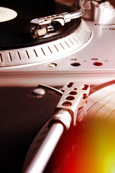 Turntable playing vinyl record with music — Stock Photo, Image