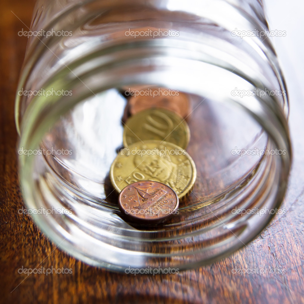 Stash of Greek euro coins in a jar