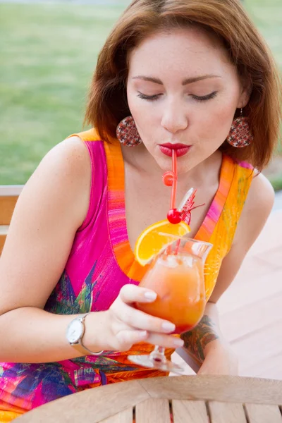 Sexy young woman drinking coctail — Stock Photo, Image