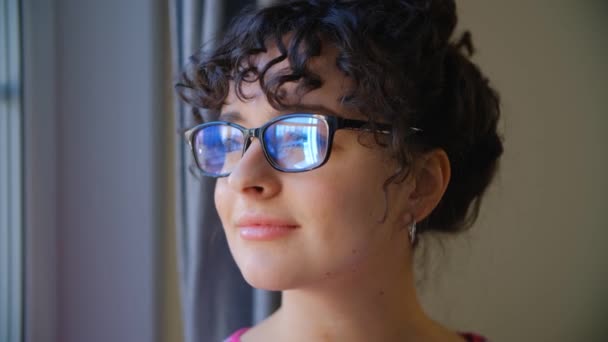 Beautiful White Woman Glasses Looking Away Thought Millenial Female Curly — Stock Video