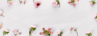 Autumn creative composition roses, hydrangea flowers on gray marble background. Fall, autumn background. Flat lay, top view, copy space