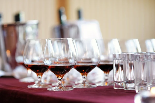 Some glasses with brandy and vodka — Stock Photo, Image