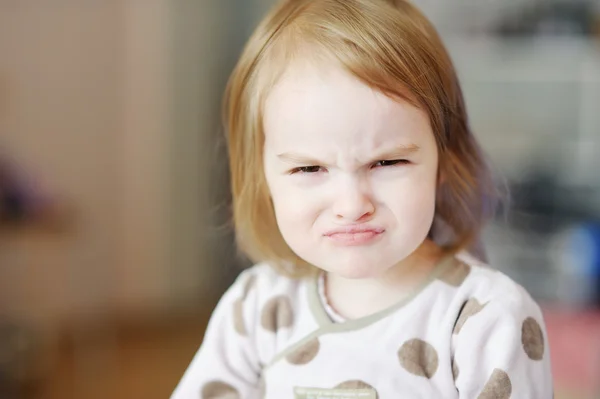 Little angry toddler girl — Stock Photo, Image