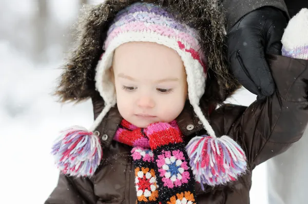Adorable toddler girl having fun at winter — Stock Photo, Image