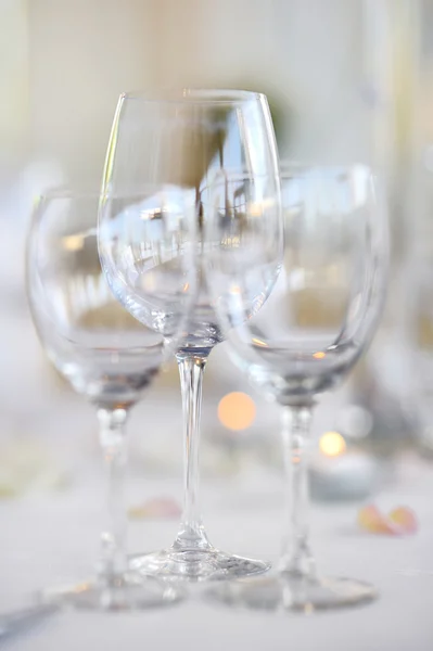 Three wine glasses on a festive table — Stock Photo, Image