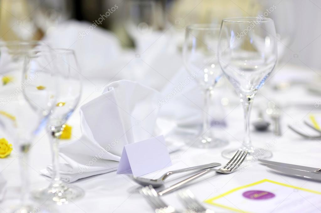 Empty place cards on the festive table