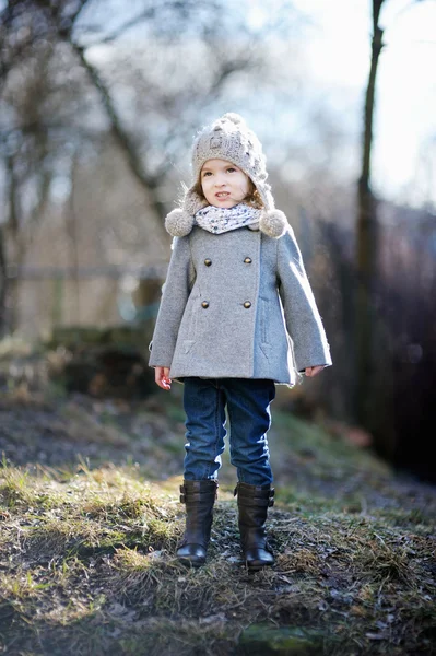 Adorable girl having fun on early spring — Stock Photo, Image