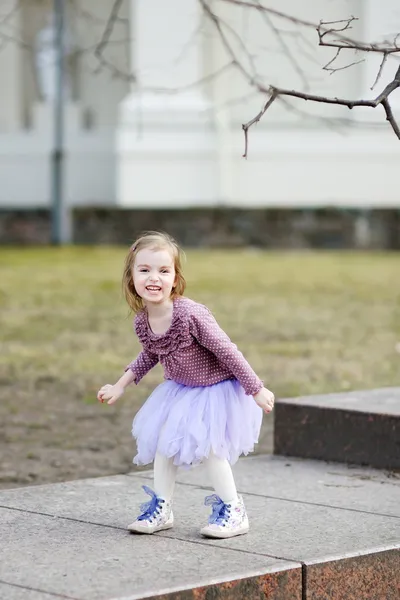 Adorable girl having fun on spring — Stok fotoğraf